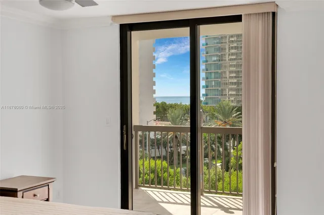 a view of a street with tall buildings