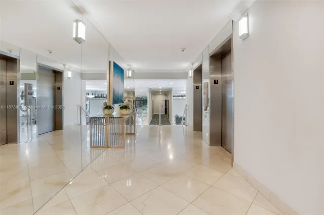 a living room with furniture a rug and a window