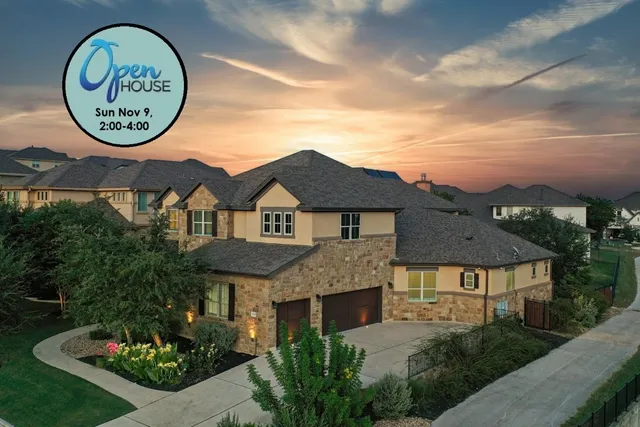 a view of a dining room and livingroom with furniture wooden floor a chandelier