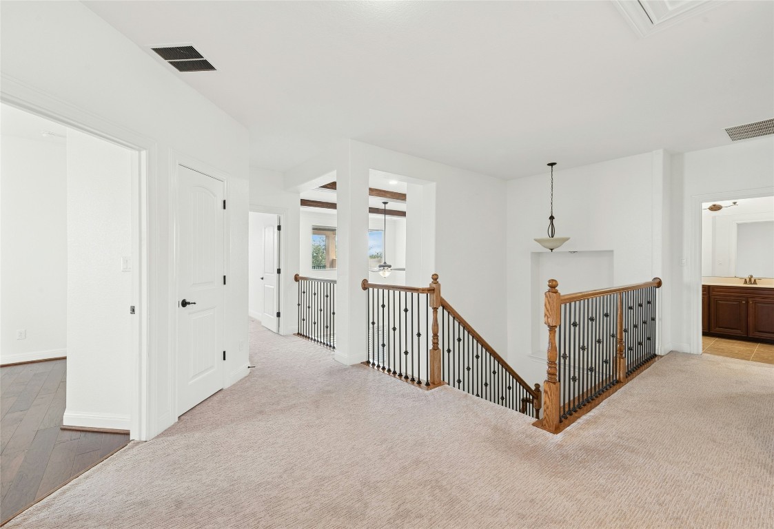 15729 De Fortuna Drive Bee Cave, TX 78738 - Photo 25 of 40 a view of a hallway with closet