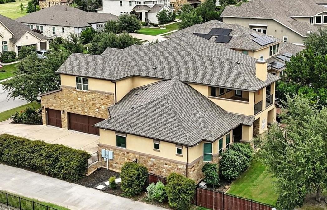 15729 De Fortuna Drive Bee Cave, TX 78738 - Photo 38 of 40 an aerial view of a house with yard and patio