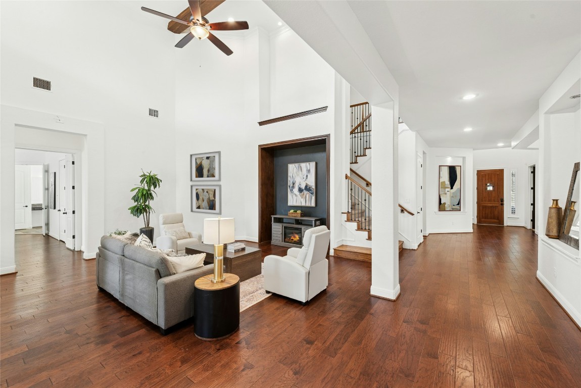 15729 De Fortuna Drive Bee Cave, TX 78738 - Photo 8 of 40 a living room with furniture and wooden floor