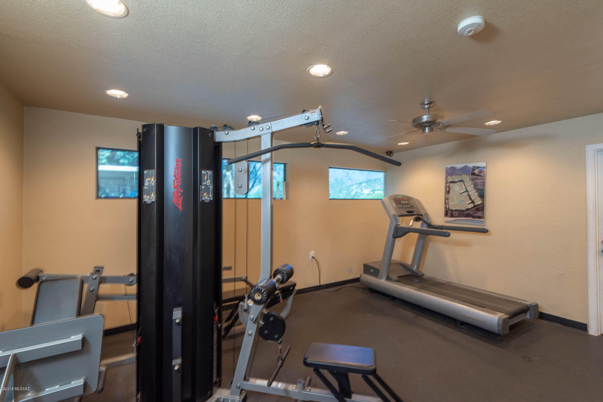 7255 East Snyder Road, Unit 8205 Tucson, AZ 85750 - Photo 21 of 23 a room with furniture and air hockey table
