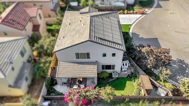 an aerial view of a city with lots of residential buildings