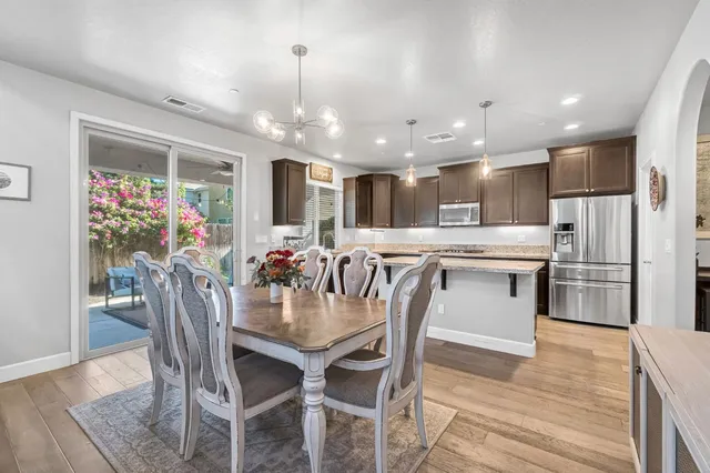 a view of a dining room with furniture