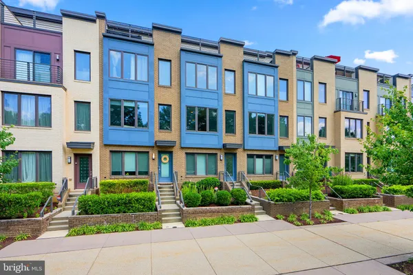 a front view of a multi story residential apartment building