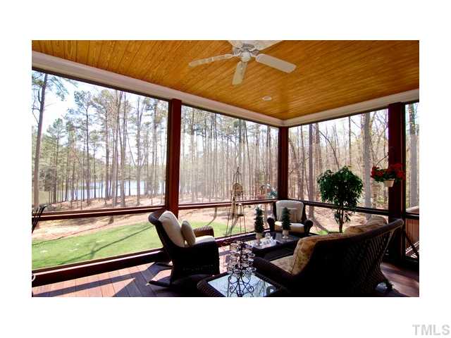 7000 Potomac Court Raleigh, NC 27613 - Photo 16 of 18 a living room filled with furniture and a large window
