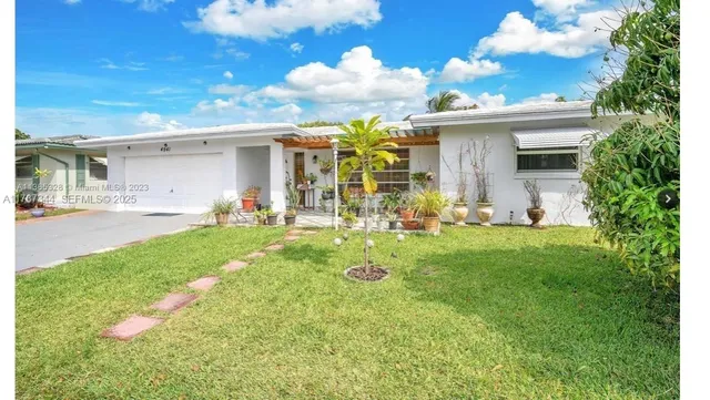 $440,000 | 4941 Northwest 55th Court, Tamarac, FL 33319