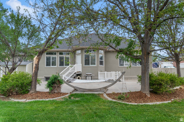 439 East 13540 South Draper, UT 84020 - Photo 39 of 46 Expansive rear patio featuring a concrete surface and white railing
