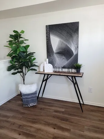 a view of entryway with wooden floor