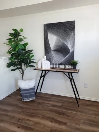 a view of entryway with wooden floor