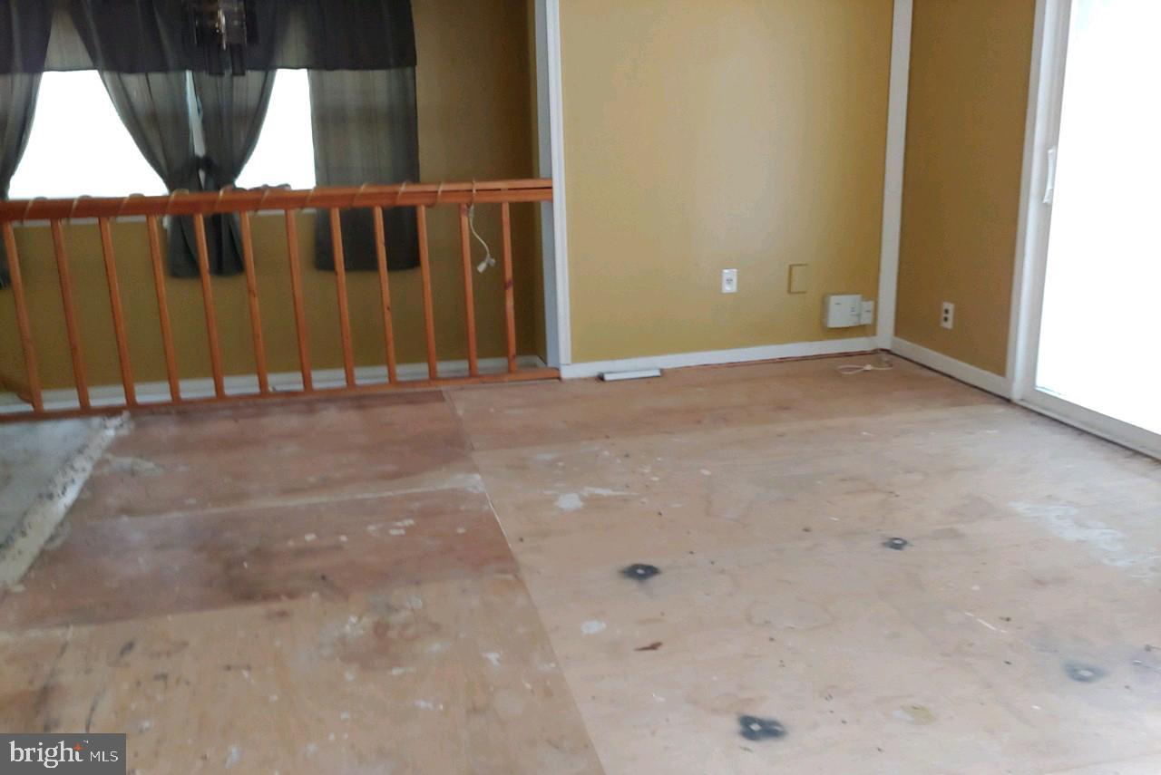 1305 2nd Road Baltimore, MD 21220 - Photo 2 of 6 a view of an empty room
