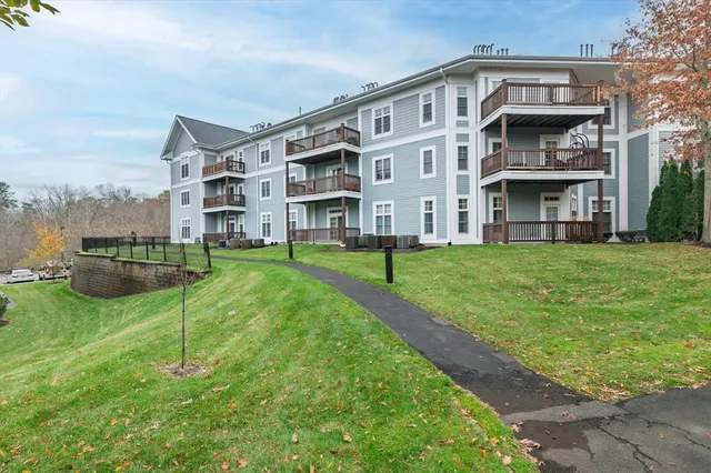 a view of building with a yard