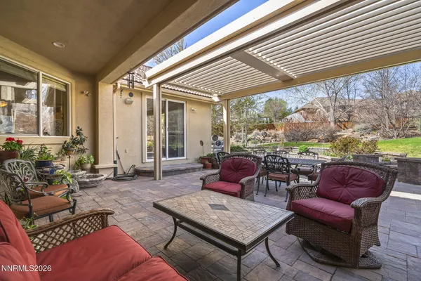 a outdoor living space with furniture and garden view