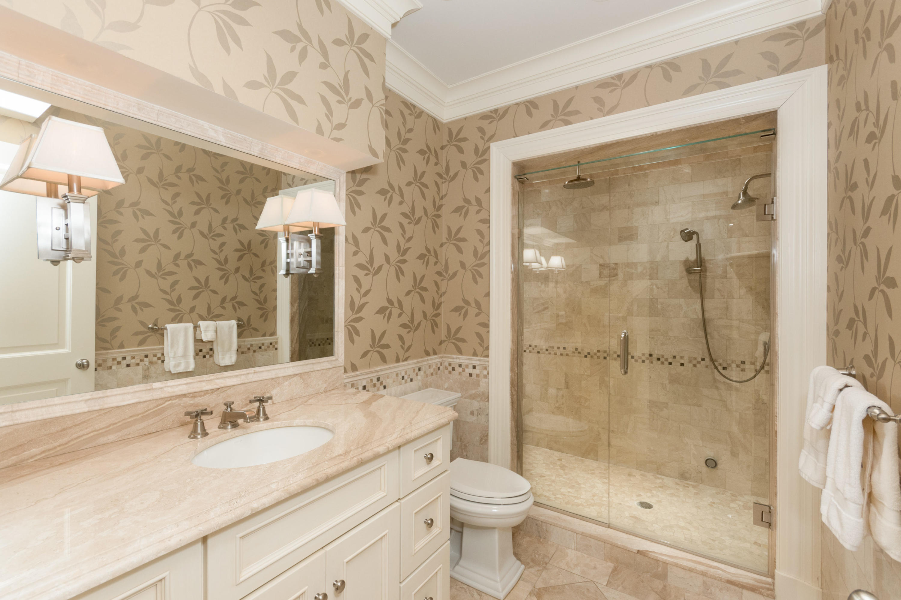 300 Brookside Road Darien, CT 06820 - Photo 25 of 41 a bathroom with a sink a toilet and shower