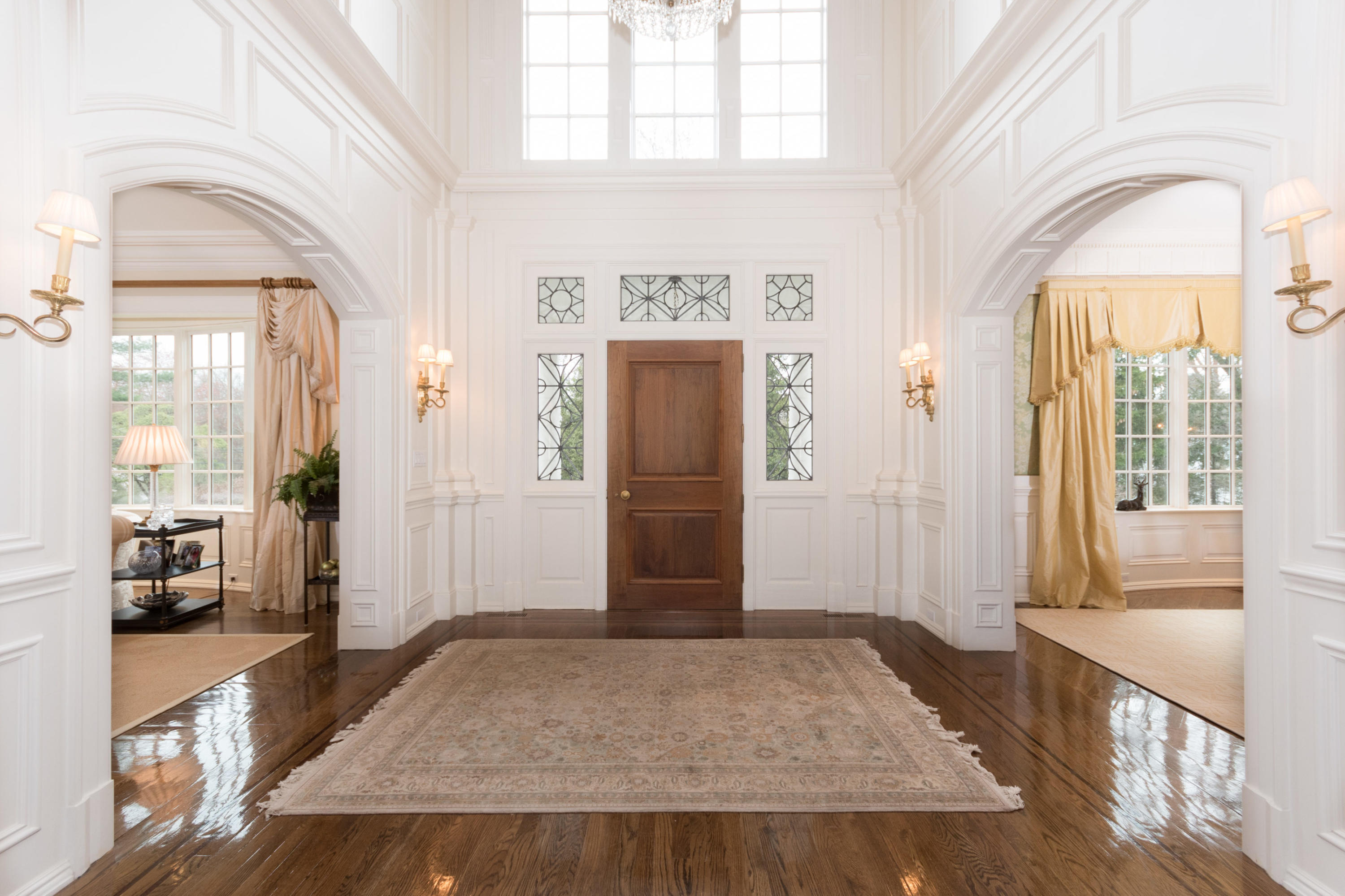 300 Brookside Road Darien, CT 06820 - Photo 7 of 41 view of hall way with wooden floor and windows