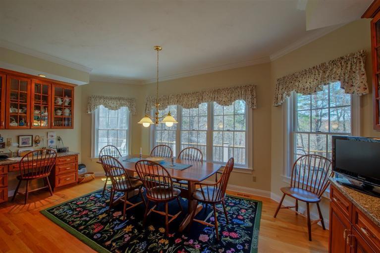 84 Farm Valley Road Osterville, MA 02655 - Photo 13 of 30 a view of a dining room with furniture window and outside view