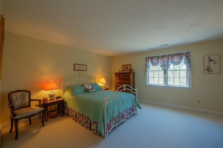 84 Farm Valley Road Osterville, MA 02655 - Photo 21 of 30 a bedroom with a bed chair and a window