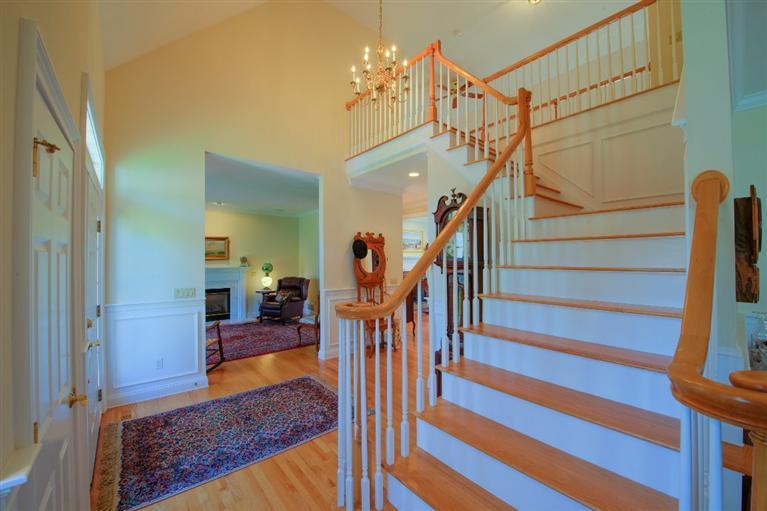 84 Farm Valley Road Osterville, MA 02655 - Photo 4 of 30 a view of entryway bedroom and hall with wooden floor
