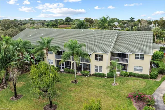 an aerial view of a city with lots of residential buildings
