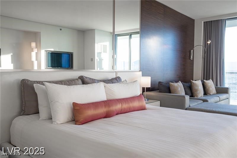 4381 West Flamingo Road, Unit 3303 Las Vegas, NV 89103 - Photo 8 of 37 Bedroom featuring multiple windows