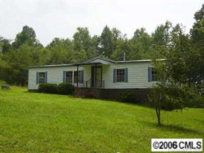 5493 Crouse Road Crouse, NC 28033 - Photo 1 of 6 a view of a house with a backyard
