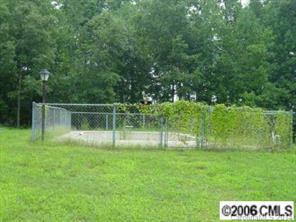 5493 Crouse Road Crouse, NC 28033 - Photo 6 of 6 a backyard of a house and trees