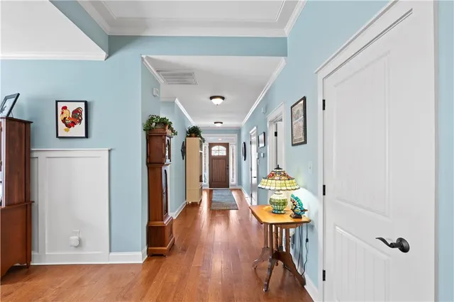 a very nice looking room with wooden floor