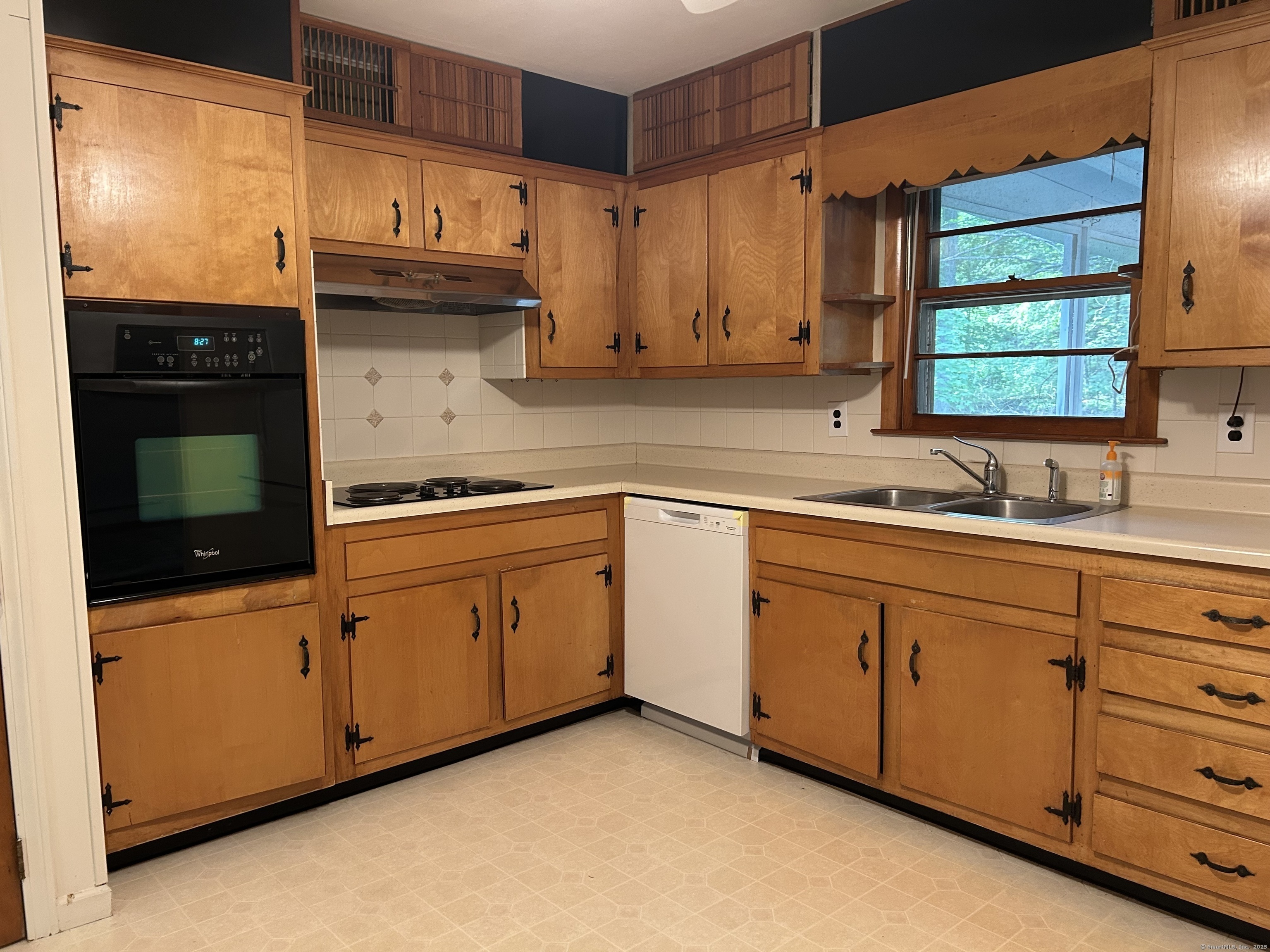 14 Aspen Ledges Road Ridgefield, CT 06877 - Photo 9 of 19 a kitchen with granite countertop cabinets stainless steel appliances and a sink