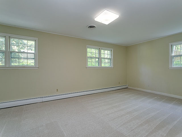 4302 Malvern Road Durham, NC 27707 - Photo 20 of 25 Large Downstairs Bedroom