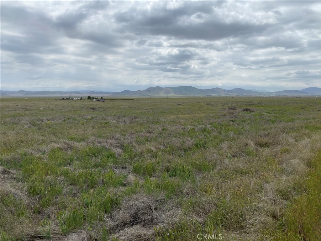 a view of an ocean and mountain