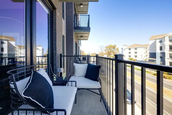 a room with gym equipment and a large window
