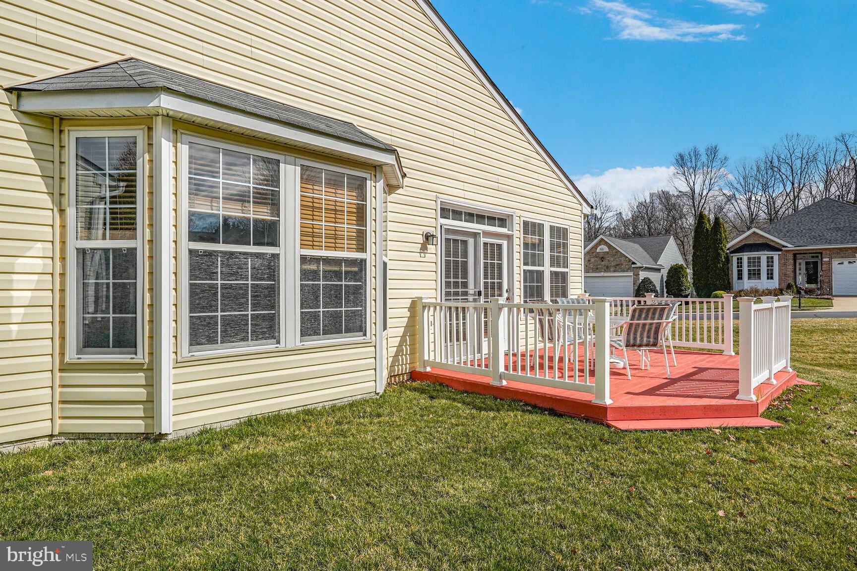 3948 Solstice Lane Dumfries, VA 22025 - Photo 18 of 27 a view of a house with a backyard