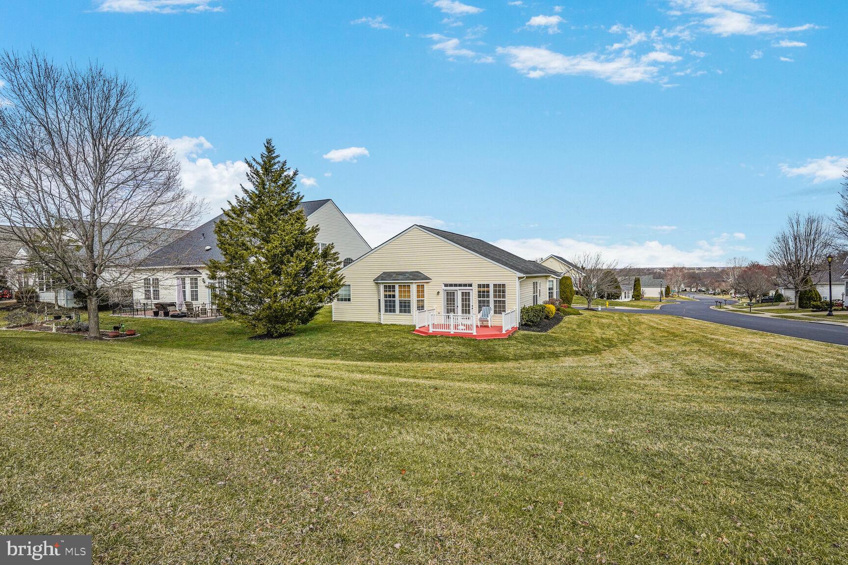 3948 Solstice Lane Dumfries, VA 22025 - Photo 20 of 27 a view of a house with a yard