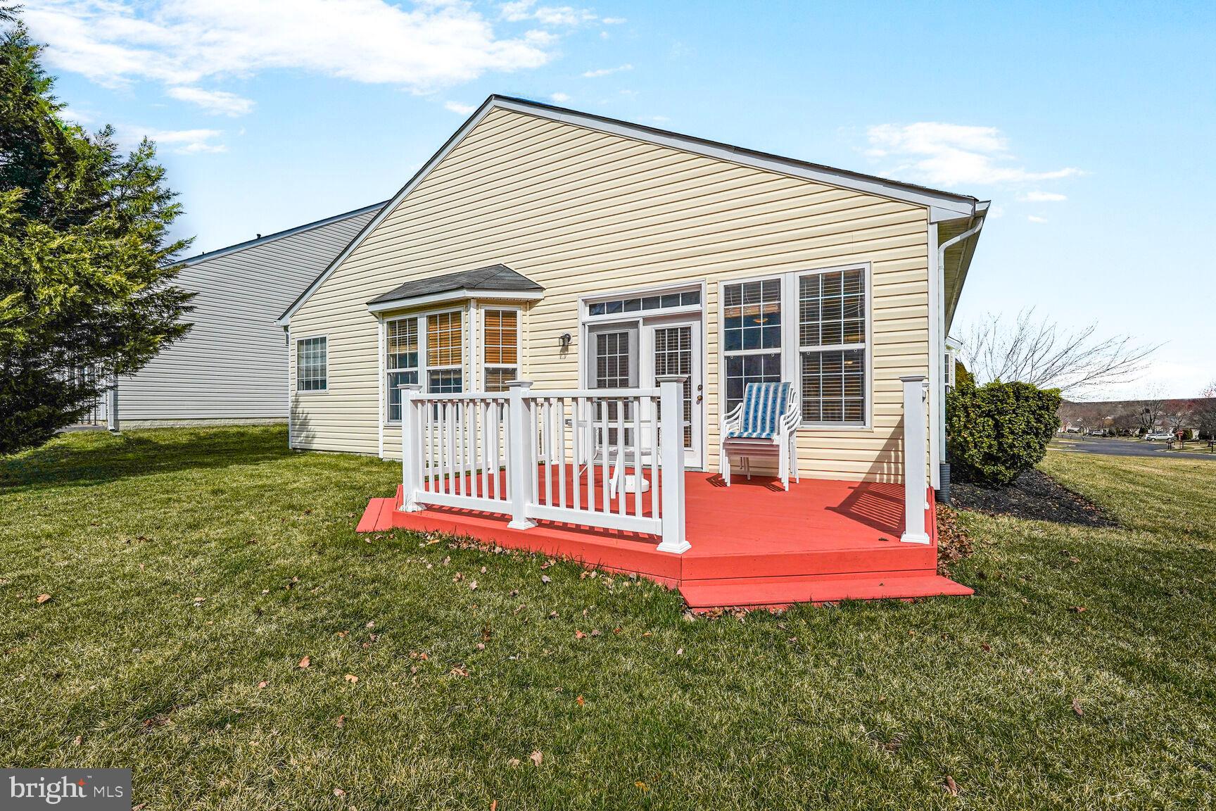 3948 Solstice Lane Dumfries, VA 22025 - Photo 22 of 27 a view of a house with backyard and porch
