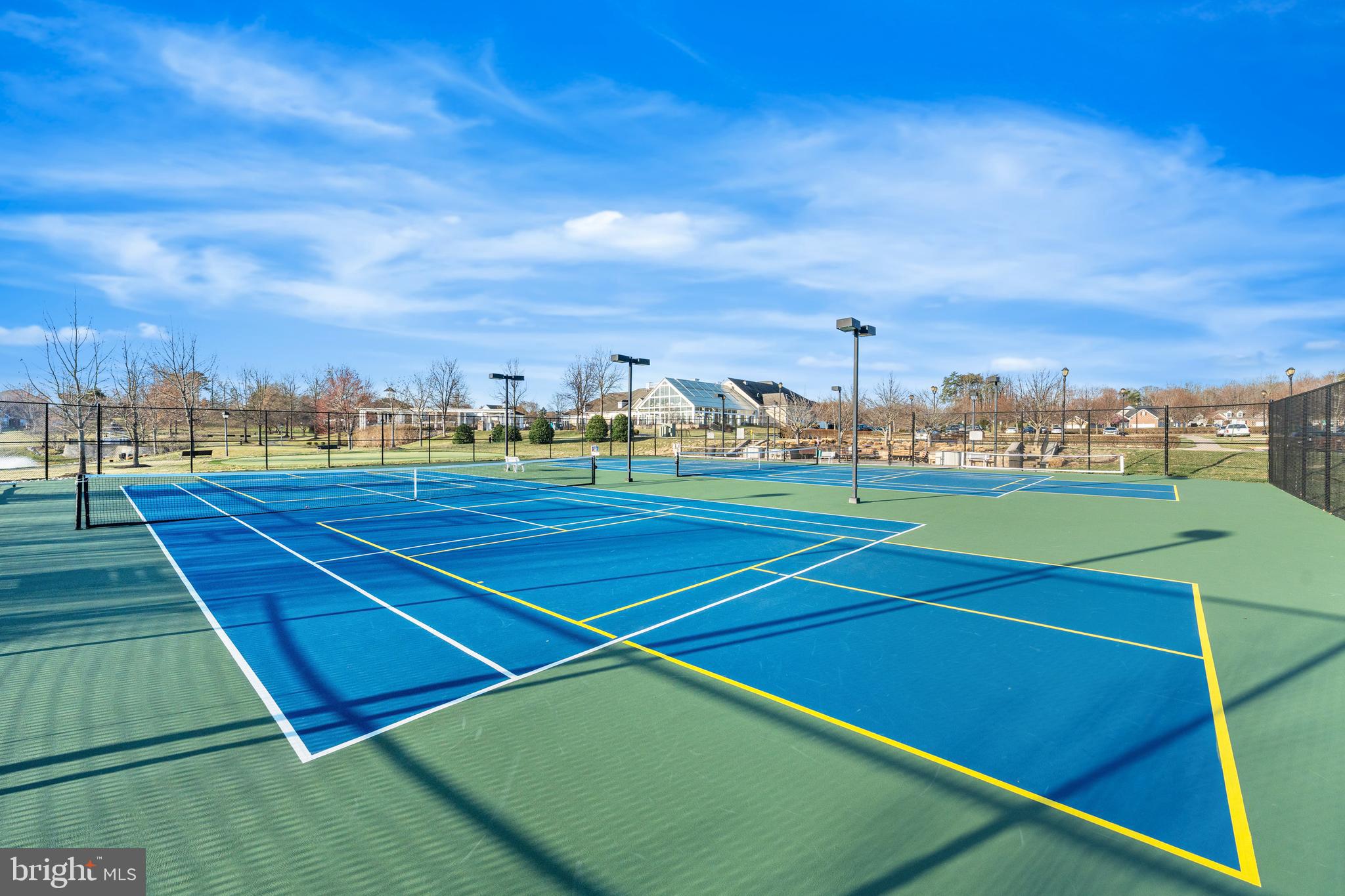 3948 Solstice Lane Dumfries, VA 22025 - Photo 26 of 27 a view of an outdoor space and tennis court
