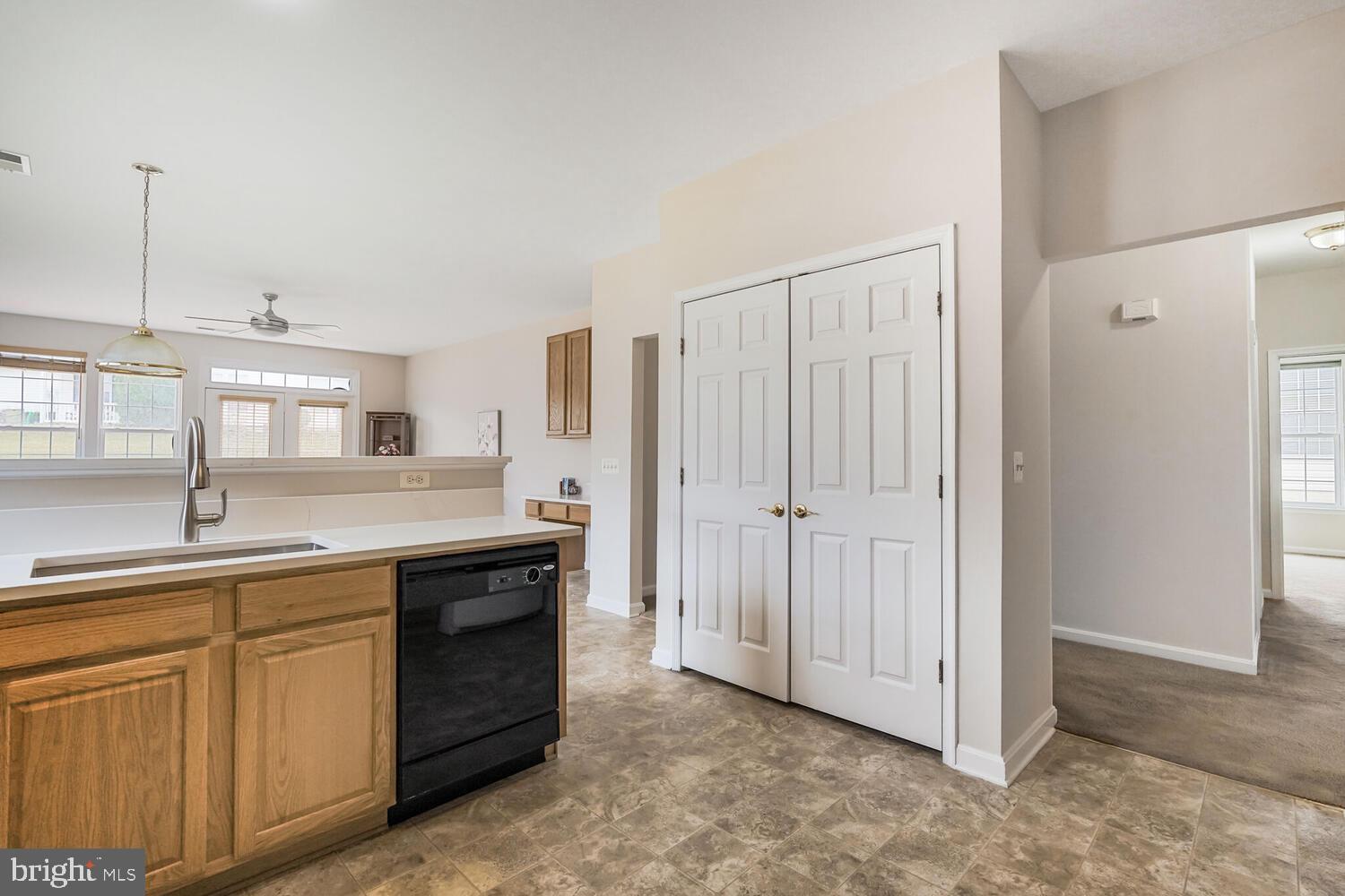 3948 Solstice Lane Dumfries, VA 22025 - Photo 9 of 27 a kitchen with a sink and cabinets