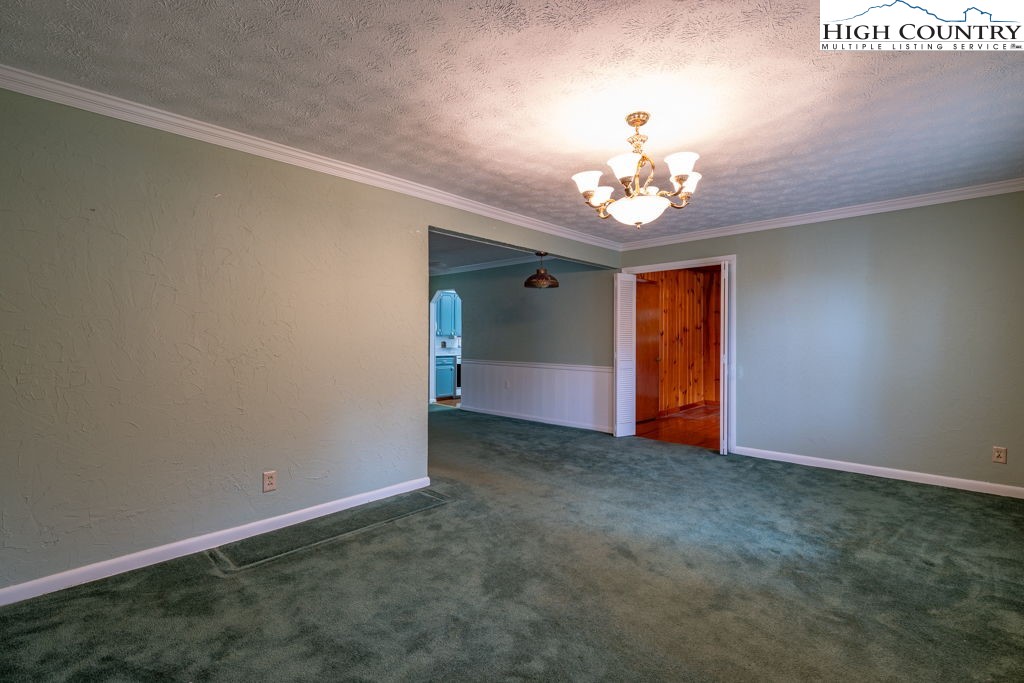 881 Queen Street Boone, NC 28607 - Photo 16 of 43 a view of an empty room with window