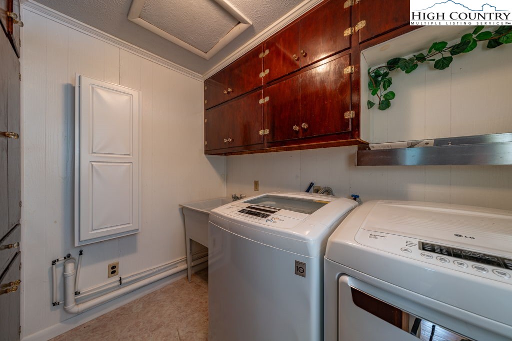 881 Queen Street Boone, NC 28607 - Photo 18 of 43 a utility room with dryer and washer