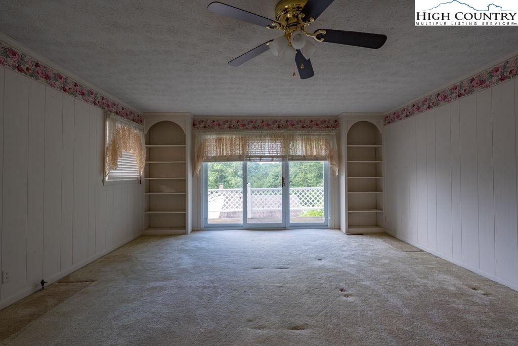 881 Queen Street Boone, NC 28607 - Photo 21 of 43 an empty room with windows