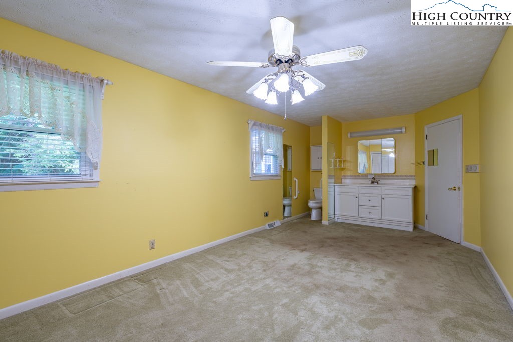 881 Queen Street Boone, NC 28607 - Photo 25 of 43 a view of a livingroom with a kitchen