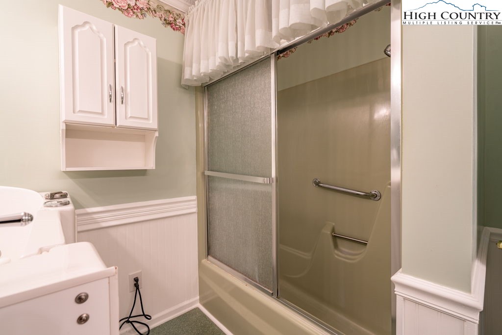 881 Queen Street Boone, NC 28607 - Photo 27 of 43 a bathroom with a sink toilet and shower