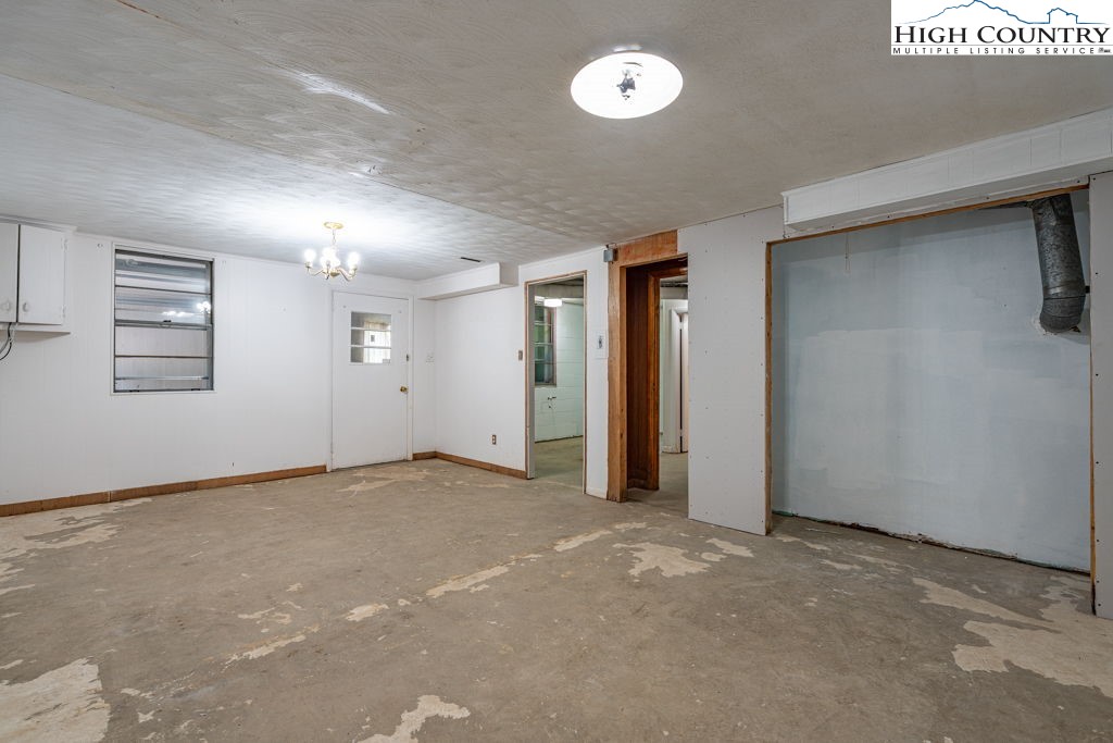 881 Queen Street Boone, NC 28607 - Photo 29 of 43 an empty room with windows