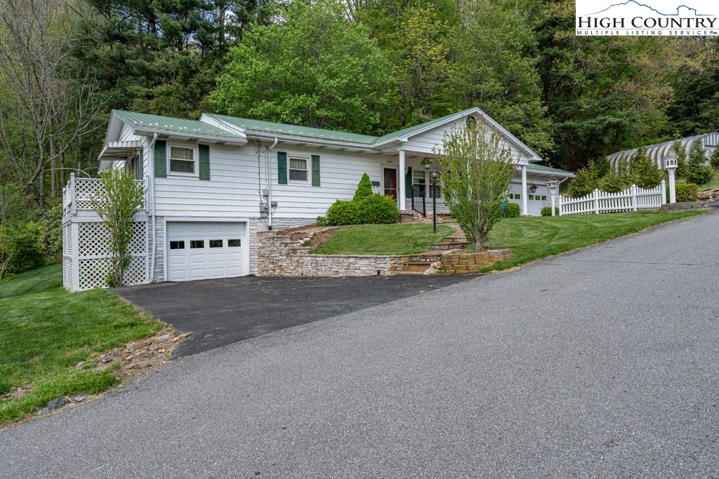 881 Queen Street Boone, NC 28607 - Photo 38 of 43 a view of front of house with a yard