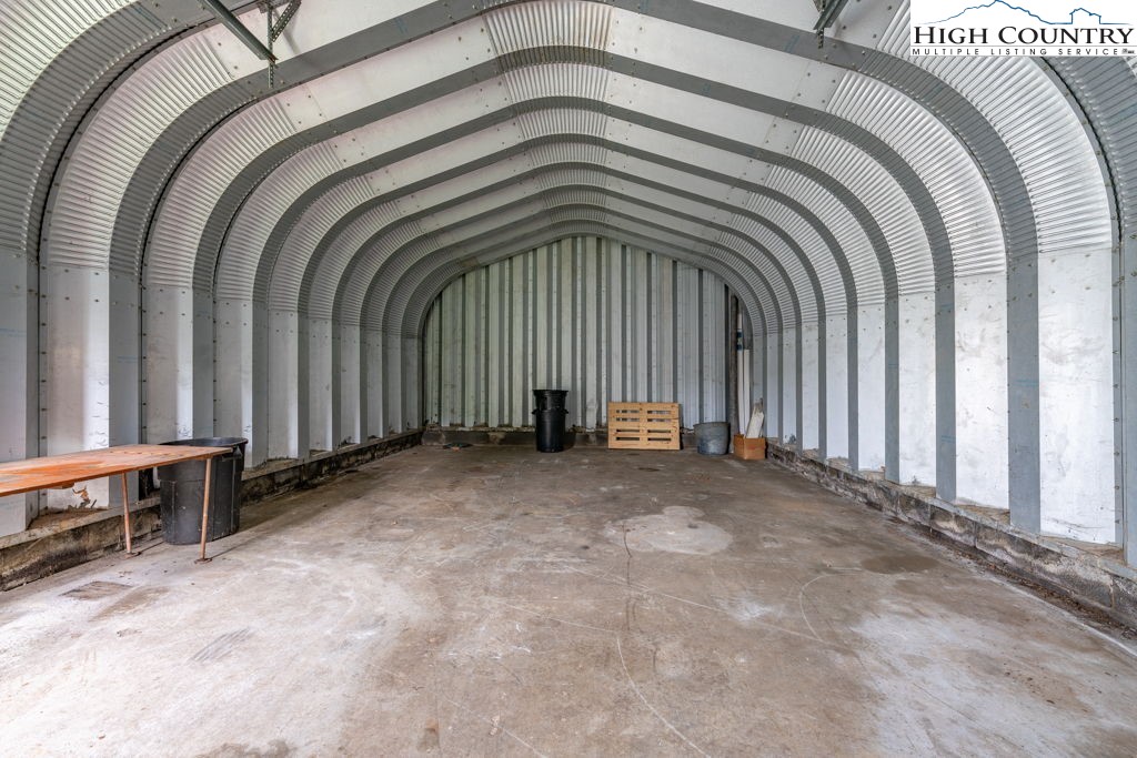 881 Queen Street Boone, NC 28607 - Photo 41 of 43 a view of a bedroom with a balcony