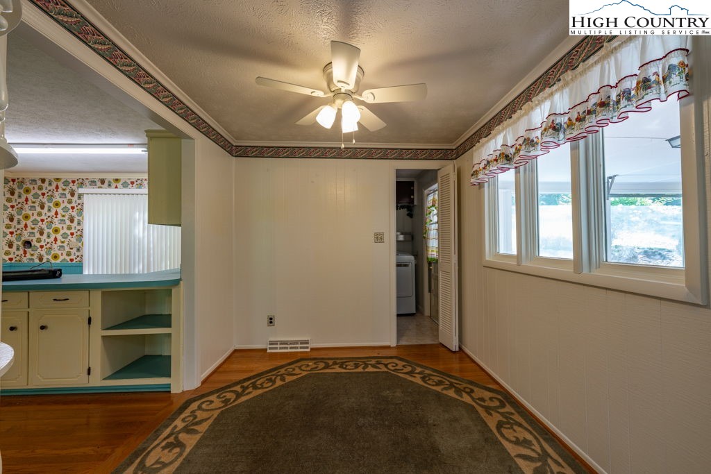 881 Queen Street Boone, NC 28607 - Photo 8 of 43 a view of a room with window and chandelier