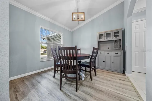 a view of a dining room with furniture
