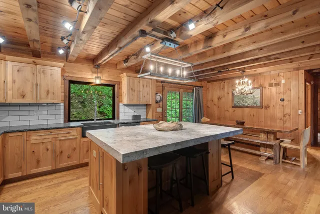 a kitchen with a stove and a sink