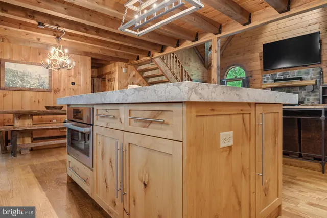 a kitchen with stainless steel appliances granite countertop a stove and a sink