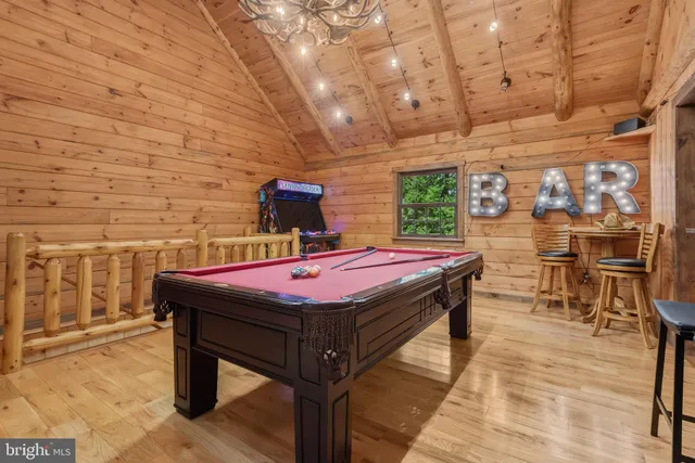 a bath room with a table and chairs